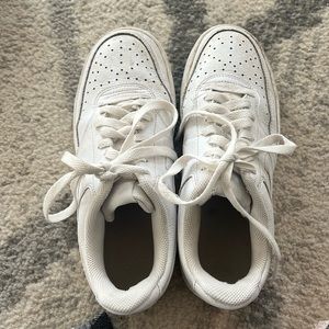 White Nike shoes *not air forces but look similar *